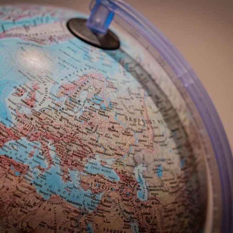 Multi-country press relations - an old map globe with Europe showing