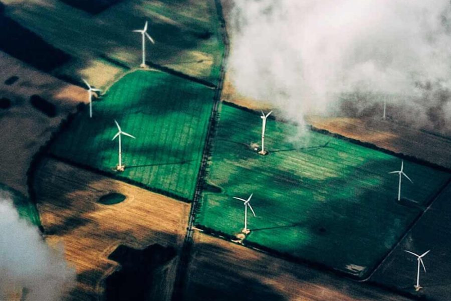 Corporate ESG - Environmental, Windfarms on the ground through the clouds