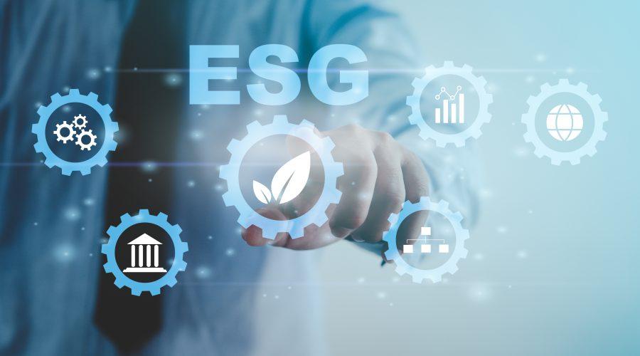 Environmental, social, and governance (ESG) investment Organizational growth that is sustainable is a business idea. A man's hand touches the ESG word on a virtual screen.